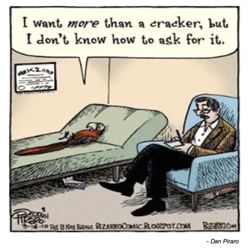 A parrot on a couch expresses desire for more than a cracker to a seated therapist.